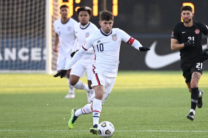 Christian Pulisic playing for the USMNT vs. Canada
